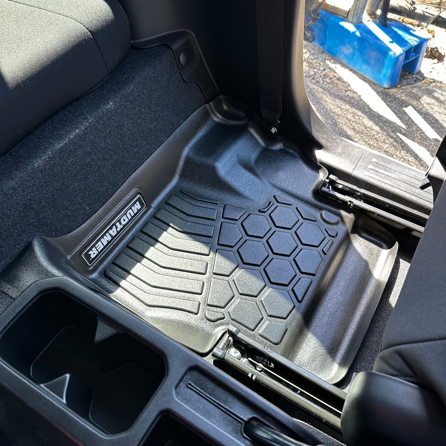 Rear MUDTAMER floor mat installed in a Suzuki Jimny
