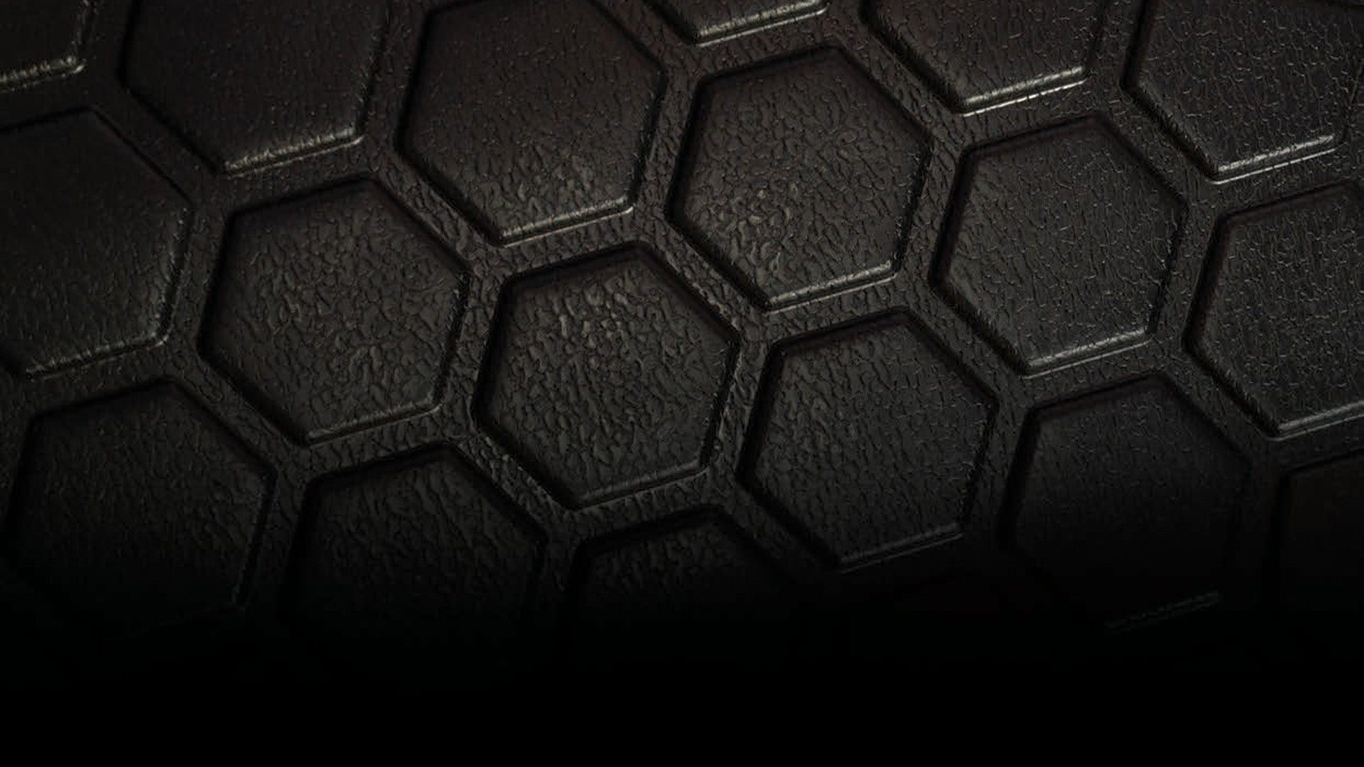 Close up of the honeycomb pattern found on the MUDTAMER floor mats
