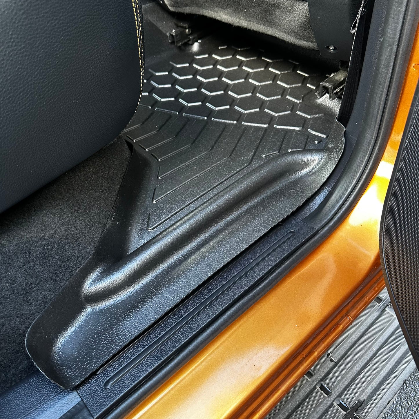 Driver's side rear MUDTAMER floor mat installed in a PX Ranger