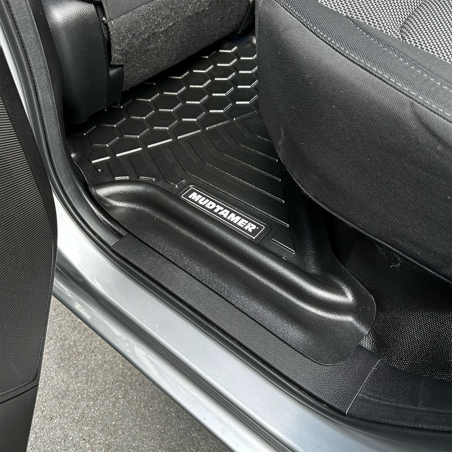 Rear MUDTAMER floor mat installed in a Mazda BT-50